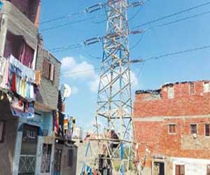   مصر اليوم - أسلاك الضغط العالي تهدد أهالى قرية كراديس في الشرقية