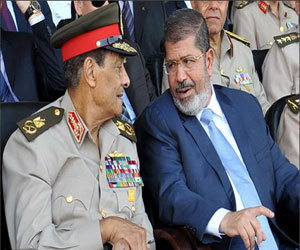 مصر اليوم - 6 أبريل تندد بـحماية مرسي قيادات المجلس العسكري من المساءلة القانونية